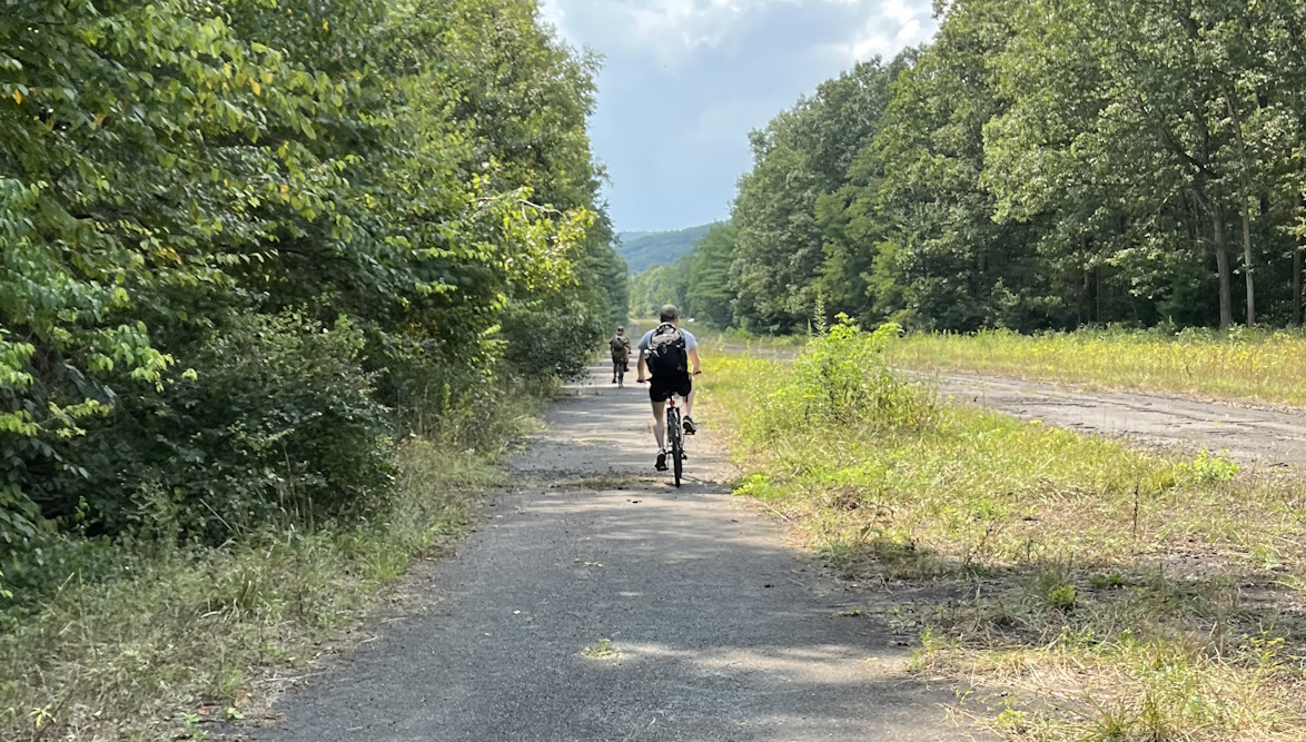 Two bicyclists on Allegheny turnpike trail
